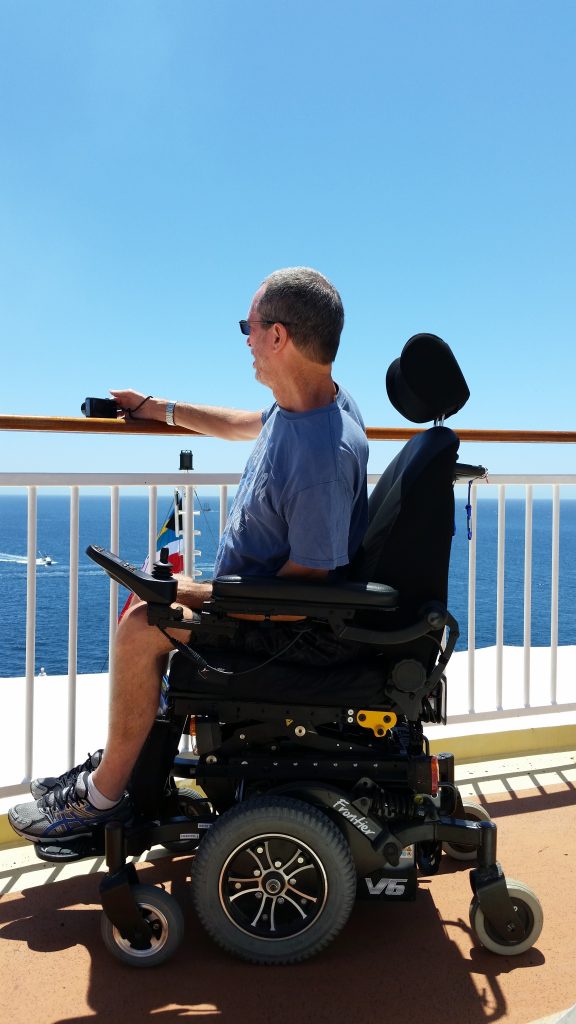 Ray in wheelchair looking over deck