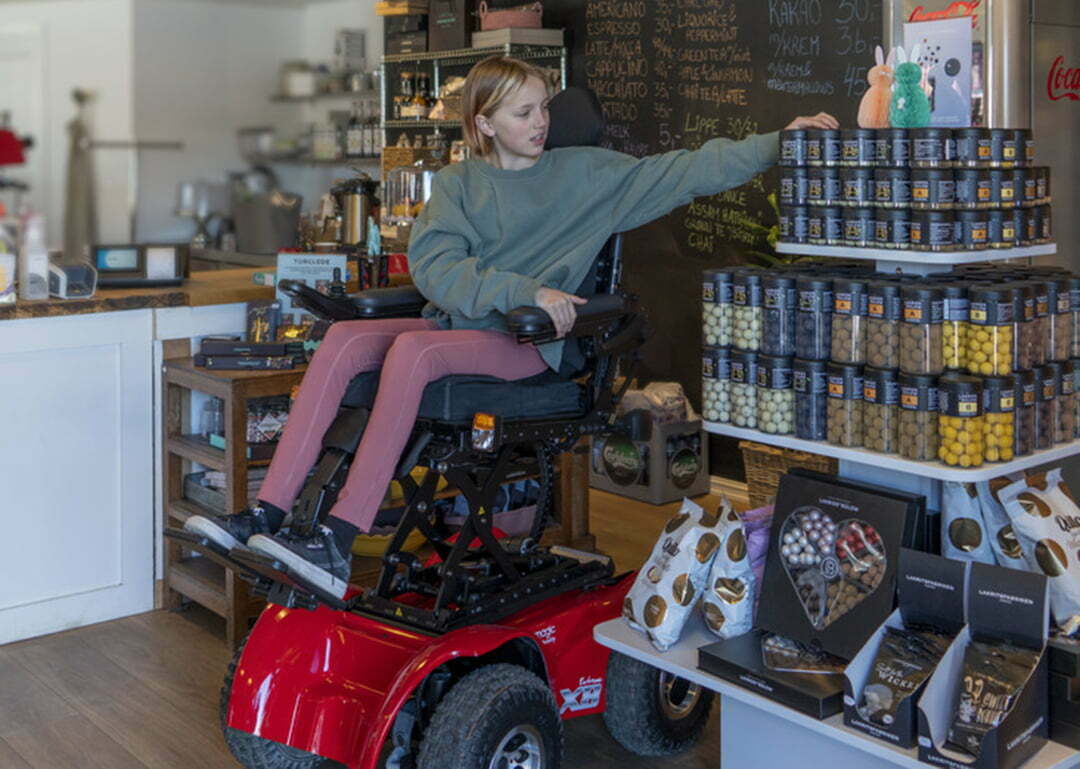 Magic Mobility's lift function means never having to ask a stranger for help to reach a high shelf.
