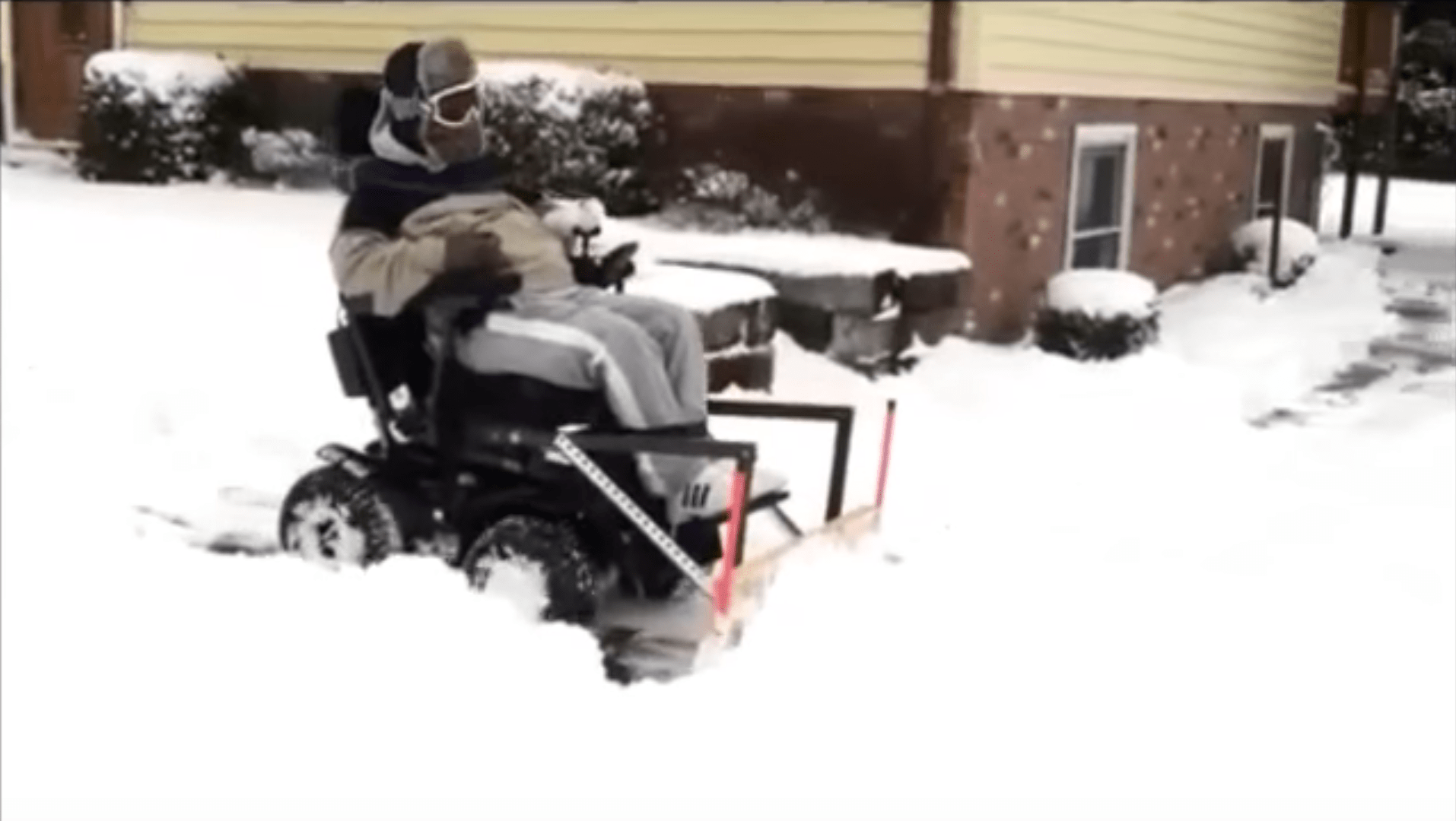 powering through snow in powerchair